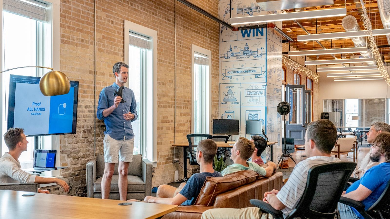 A hiring team reviewing candidates in a bright office